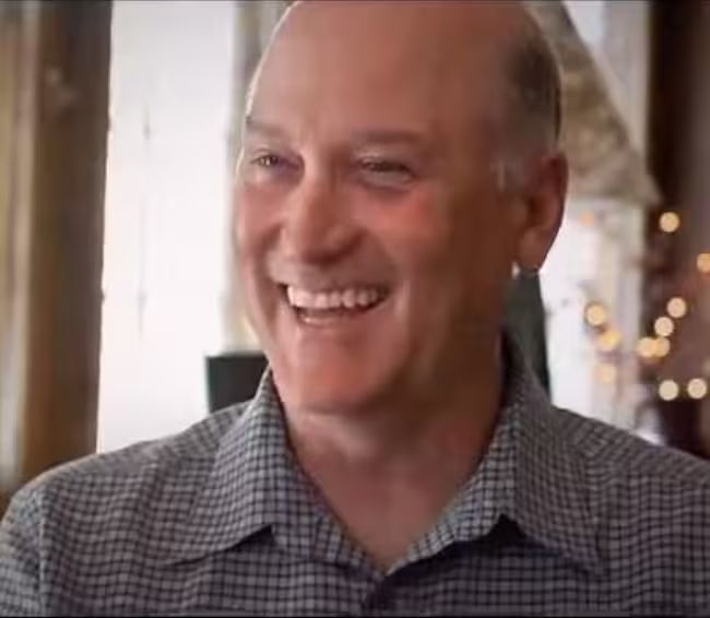 Denis Smile Headshot